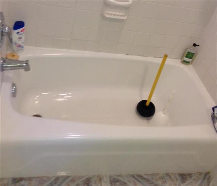 cleaned tub after sewage backup