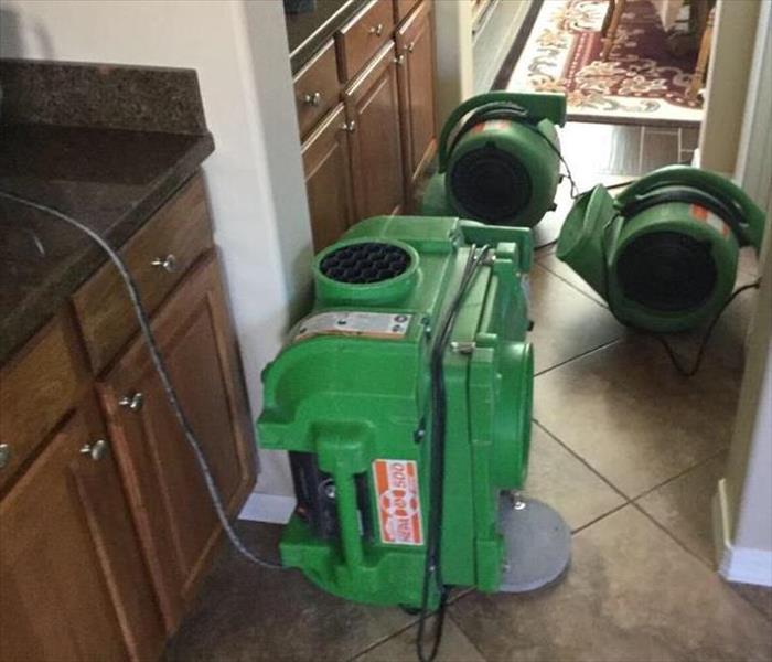 SERVPRO drying equipment being used for a kitchen flood